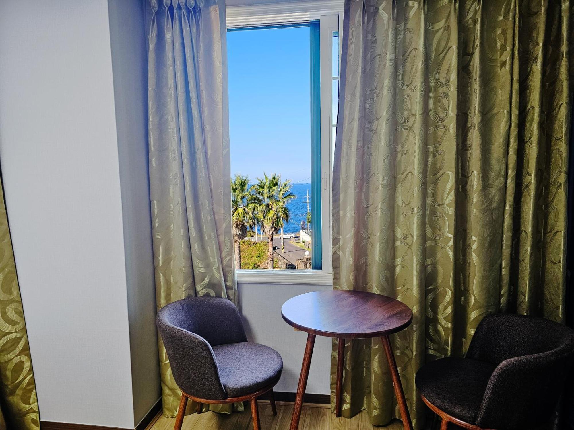 Sea Cliff Hotel Чеджудо Экстерьер фото