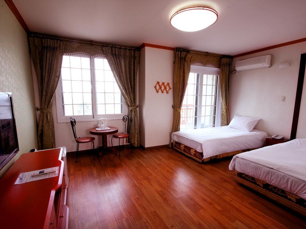 Sea Cliff Hotel Чеджудо Экстерьер фото